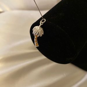 Silver palm tree charm